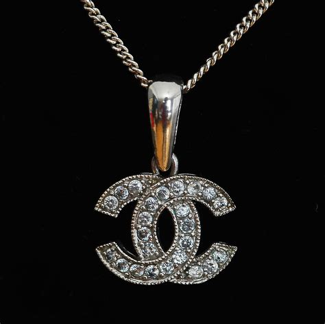 chanel logo pendant silver|chanel pendant logos 10k.